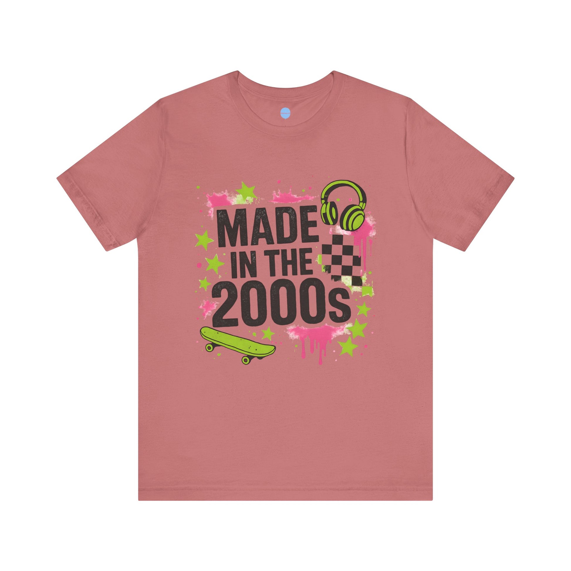 Pink t-shirt with 'Made in the 2000s' graphic design on a white background